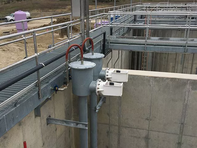 Two airlift pumps located in a wastewater treatment system