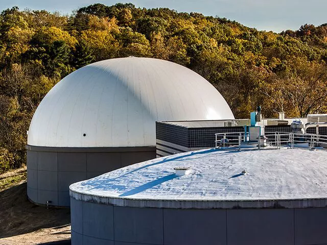 Two different tank covers one made of steel and the other made of membrane