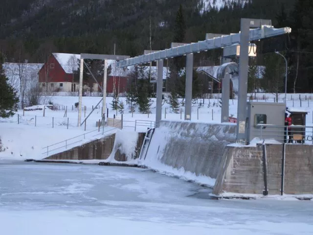 View of Brackett Bosker Automatic Raking Machine in winter